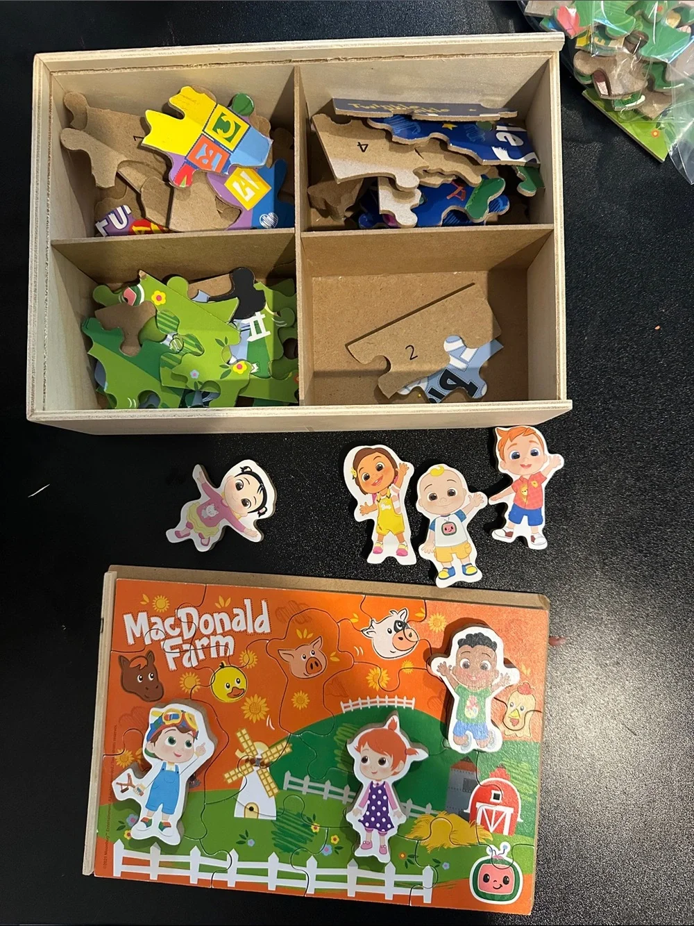 Lot of CocoMelon kid puzzles. Medium difficulty (20-24 pieces)